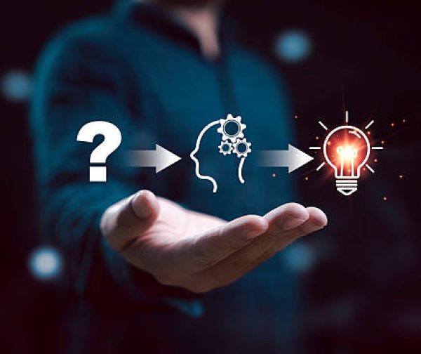 Businessman holding illustration from questioning to understanding and finally achieving an idea. It symbolizes the process of thought and innovation, highlighting creativity and problem-solving.